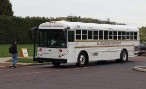 University bus number 17 stops at the library lot to pick up students. 