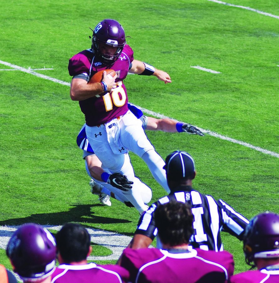 Redshirt freshman quarterback Logan Leiby (pictured above) scrambles out of the pocket in Bloomsburg’s opening loss to Stonehill College this past Saturday.