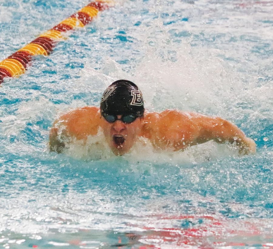 A BU team member swims the breaststroke in the medley portion of the race.