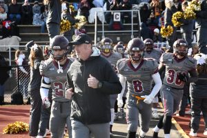 BU head football coach sacked
