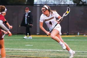 Kelsey Clauss tallied three goals and three assists in win.