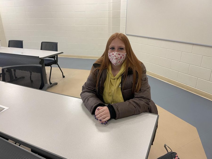 Junior student Tory Aldinger sits in Bakeless. She hopes that classes remain in person. 