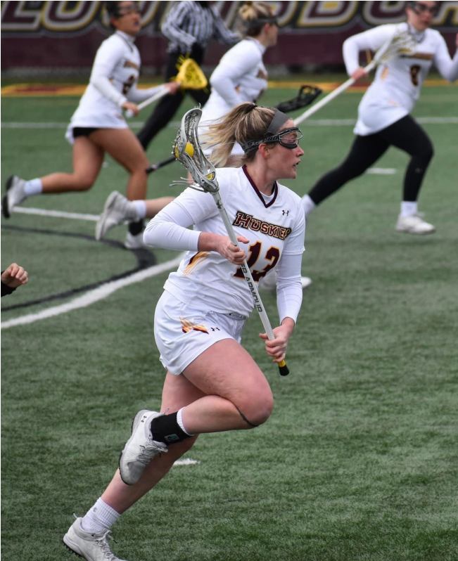 Erika Biehl makes her way down the field.