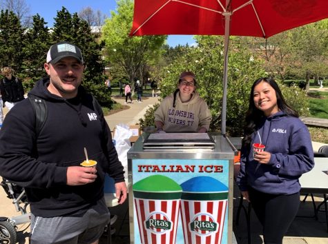 “Eithan Marino and Kimberly Speec pose holding Rita’s Ice, provided by Meghan Molloy. Photo by Colton Bryner. 