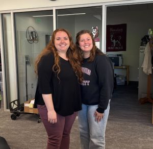 Jessica Halliagn and Olivia Antonucci, student workers, of the admissions office. Photo by Kyla Leathers. 