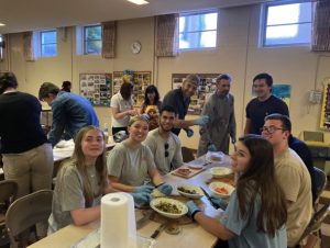Pictured (from left): Victoria Conrad, Reese Kropp, Nick Rohmann, Ethan Anderson, Rev. Roman Petryshak, Ben Dries, Luke Carter, Ava Sheppard. Photo by Bob Heckrote. 