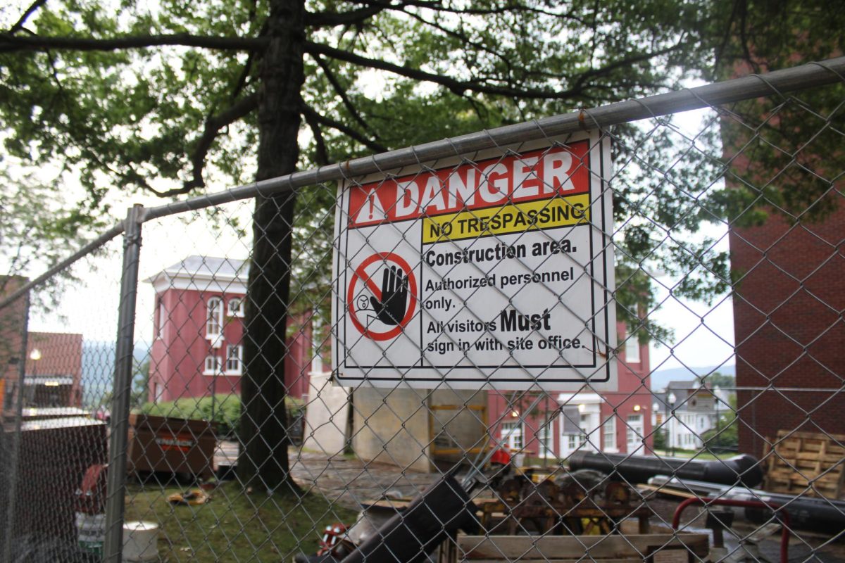 Danger signs are hung warning those to not set foot on construction grounds. 