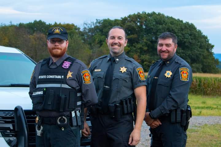 Constables Joel Ludwig (Cleveland Township) is to the left, Tom Anderson, and Michael Anderson (Jackson Township) is to the right.