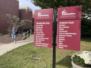 New Commonwealth University signs around campus.