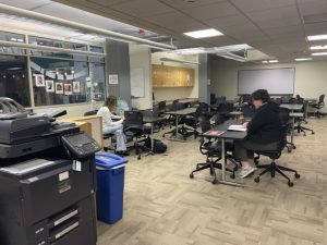 Student Lead Bella Brisgone and Tutor Faith Dinsmore working in the Learning Center