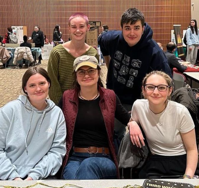 Some members of the Photo Club at the activities and involvement fair in January. Photo taken from the Photo Club Instagram page @bloomu_photoclub