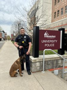 Officer Elijah Middaugh with K9, Rush. 