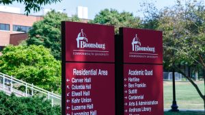 Signage on Bloomsburg's campus shows off "Commonwealth University" name. Photo by Eric Wood.