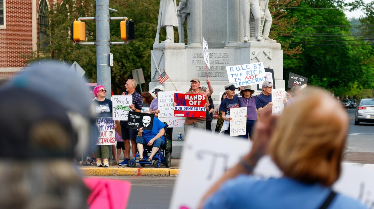 Protestors across from the fountain in Market Square