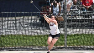 Briannan Eckard throwing during a meet. 