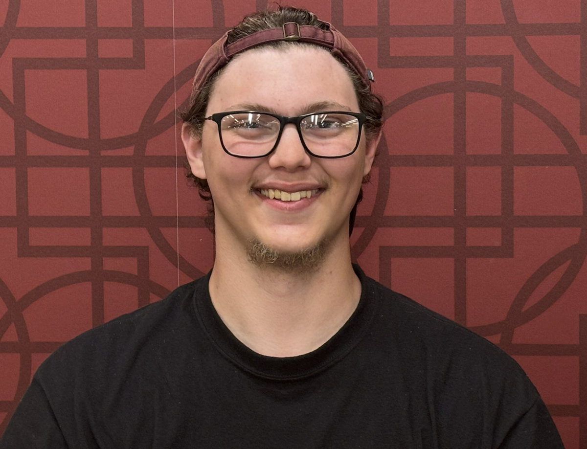 Photo of John Saunders, a senior in the music education program.