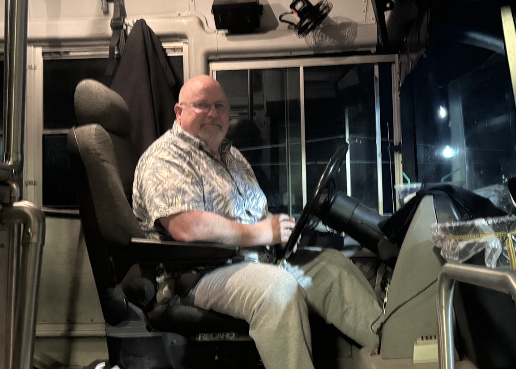 Micky McElroy driving the shuttle.