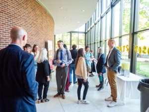 Media and journalism faculty and students enjoying refreshments after the Spring Media and Journalism Awards.